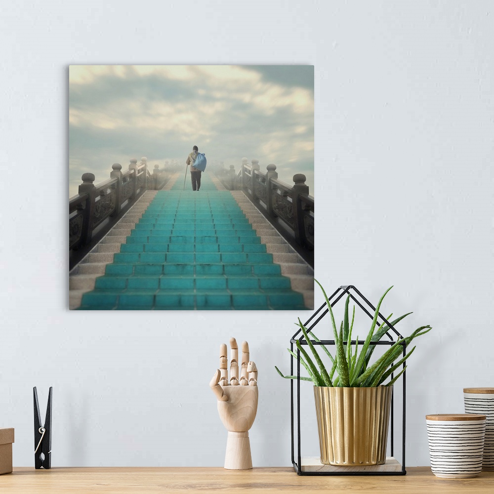 A bohemian room featuring Conceptual image of a man with a bag walking up a set of turquoise stairs into the clouds.