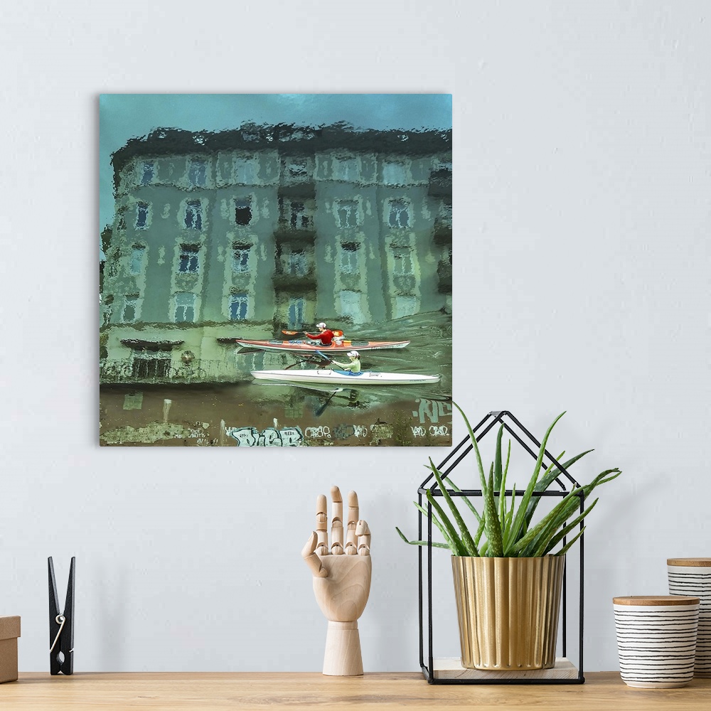 A bohemian room featuring Buildings and graffiti of Hamburg, Germany, reflected in the water as two kayakers paddle through.