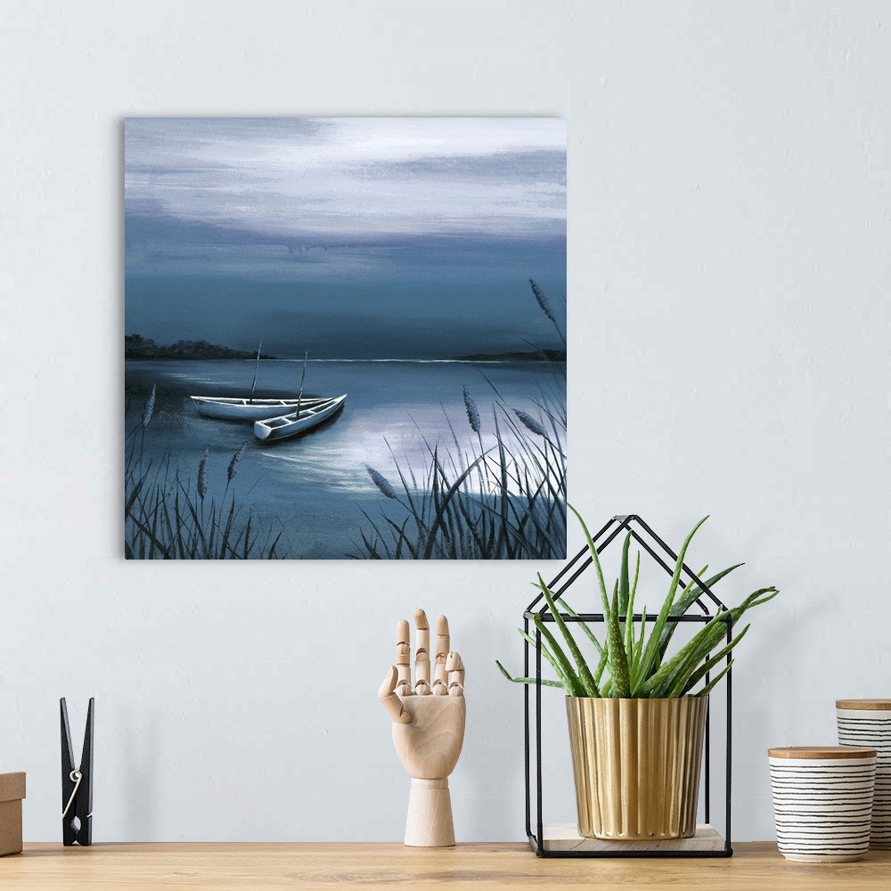 A bohemian room featuring Painting of two wooden boats at the edge of a lagoon in shades of deep blue.