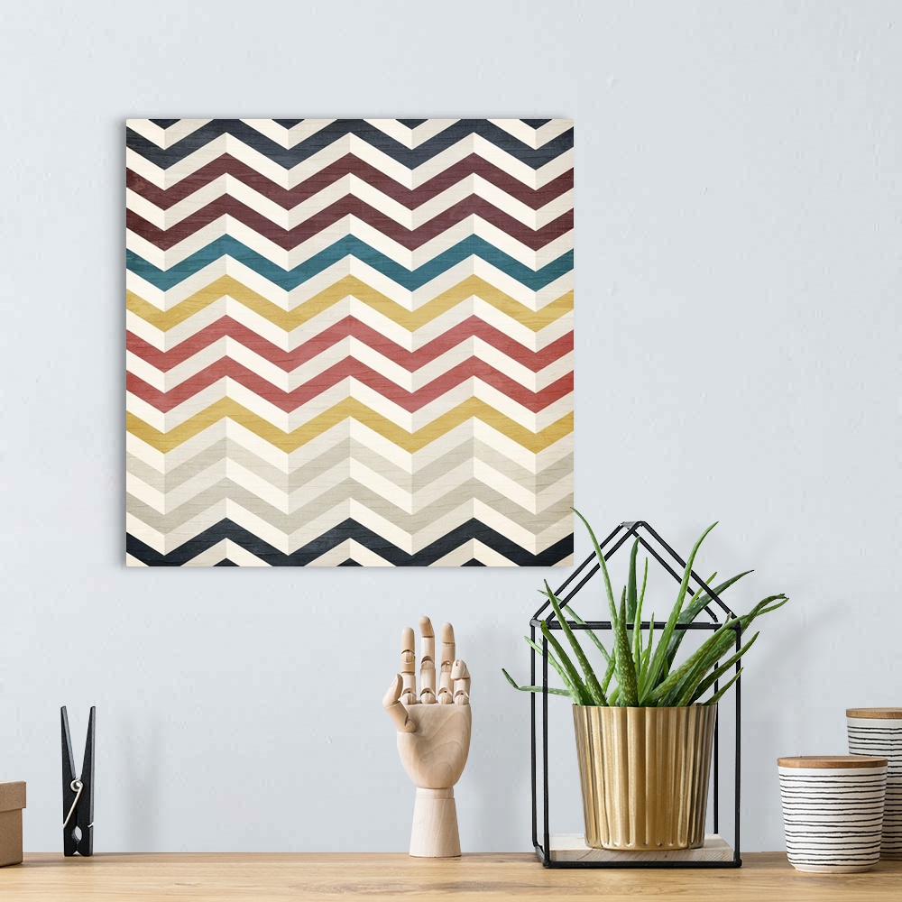 A bohemian room featuring A painting of a colorful zigzag pattern on a wood grain background.