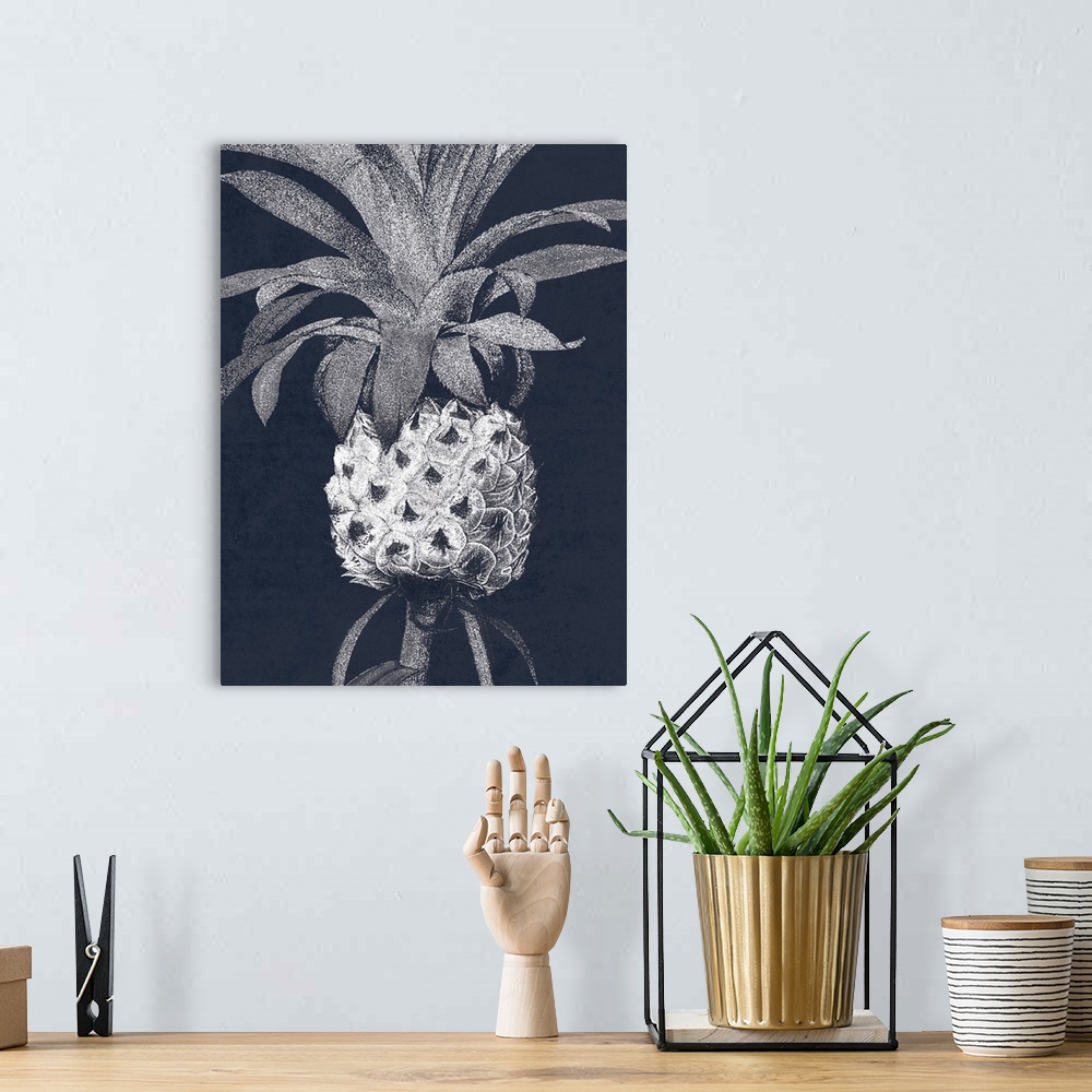 A bohemian room featuring A painting of a white pineapple on an indigo background.