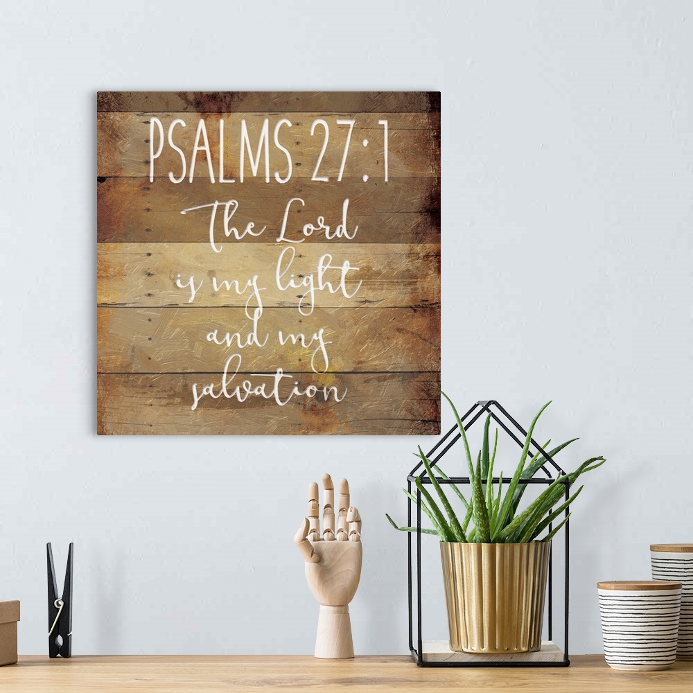 A bohemian room featuring Typography art of the Bible verse Psalms 27:1.