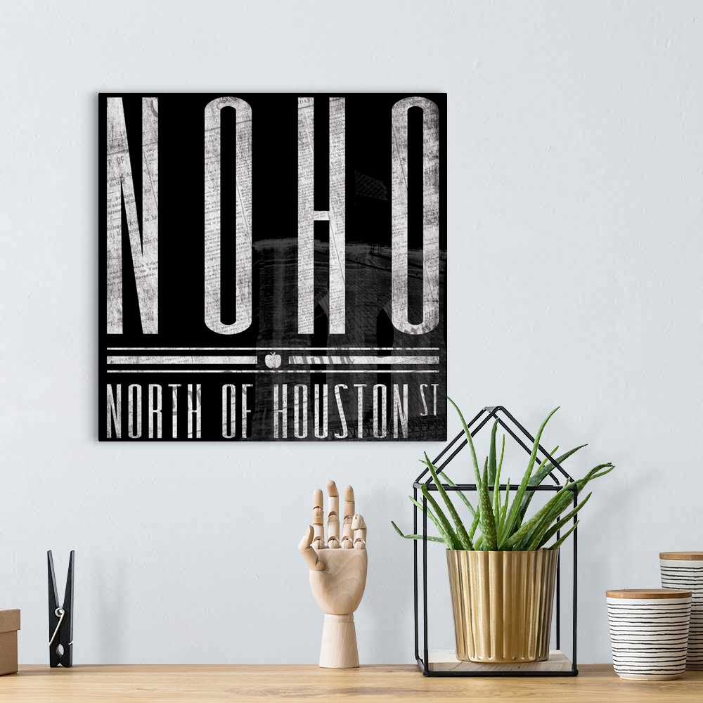 A bohemian room featuring Typographical artwork of New York City destination NOHO against a black background, with building.