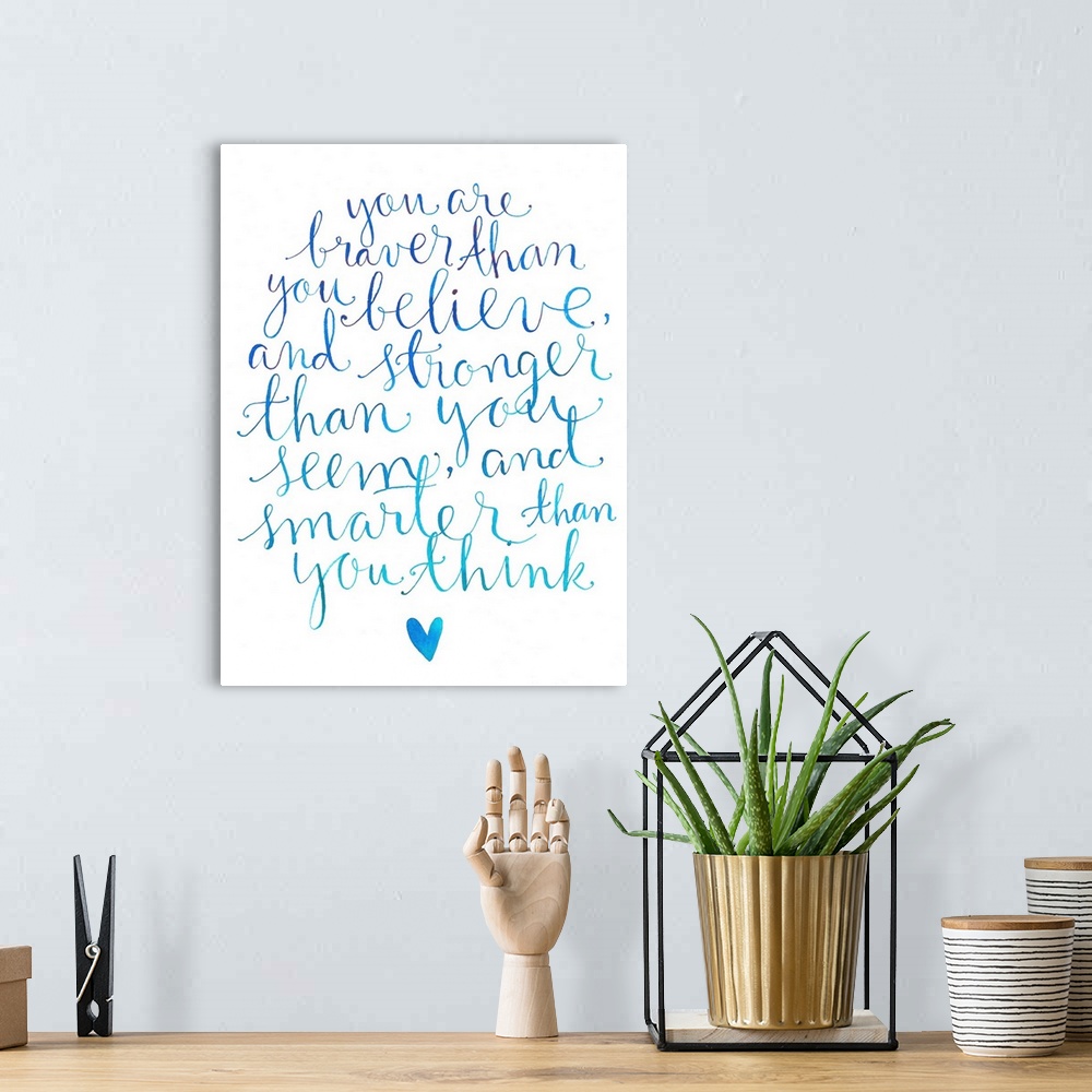 A bohemian room featuring A handlettered inspirational quote about not underestimating your abilities done in varying shade...