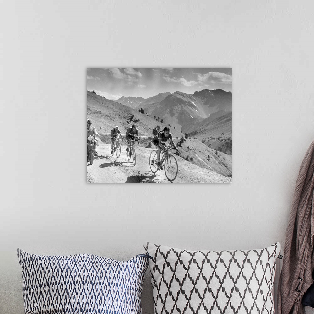 A bohemian room featuring 18th August 1951:  Cyclists competing in the Tour de France riding through the French Alps Origin...