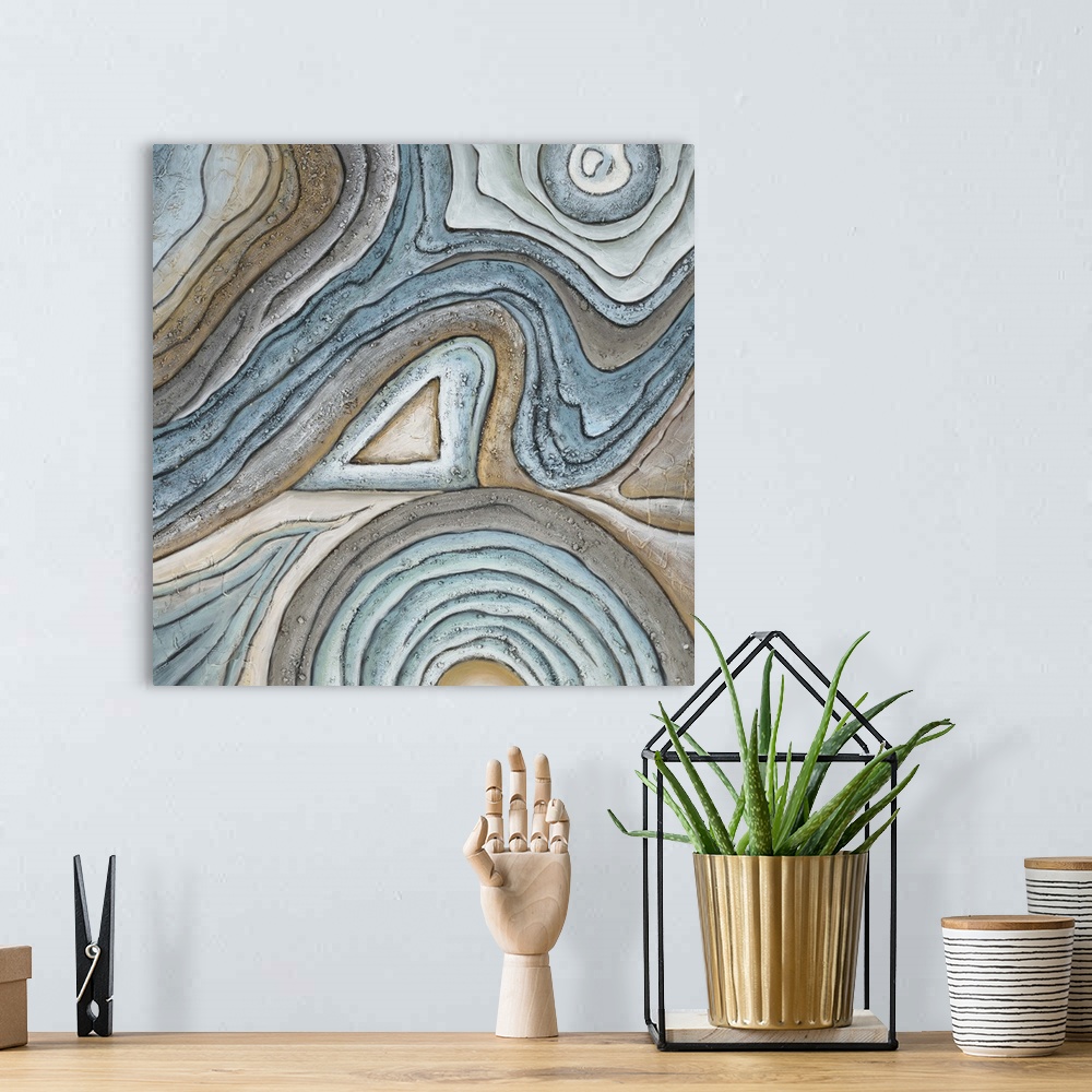 A bohemian room featuring Contemporary abstract artwork of a close-up view rock sediment.