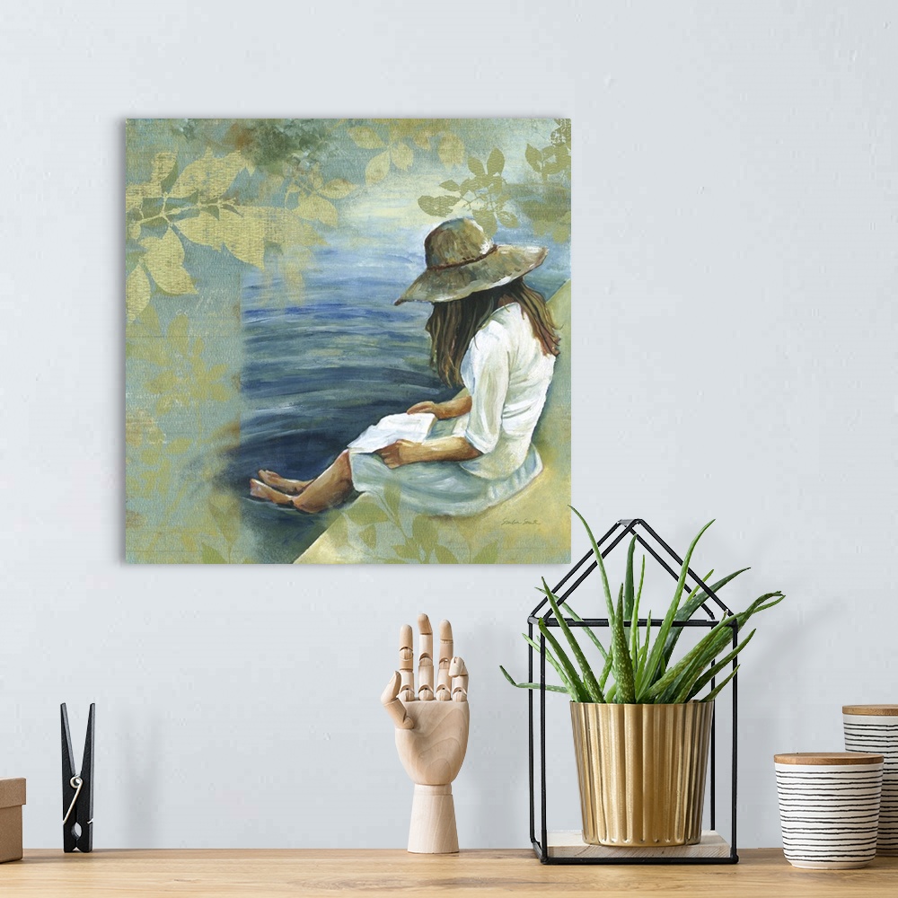 A bohemian room featuring Painting of a woman with a wide-brimmed hat reading a book with her feet in the water.