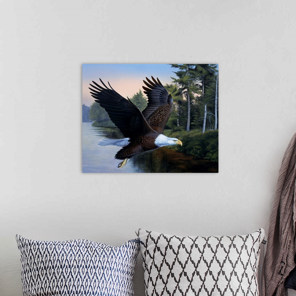 A bohemian room featuring An eagle flying over the water.