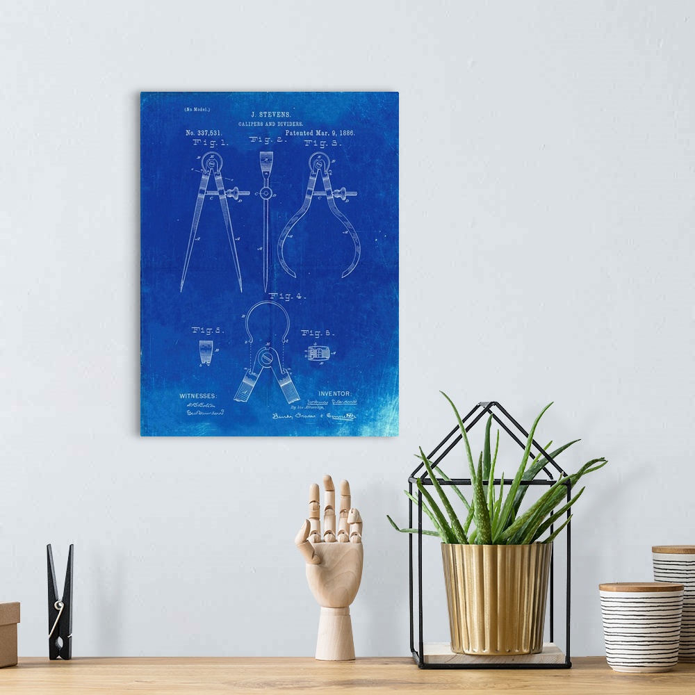 A bohemian room featuring Faded Blueprint Calipers And Dividers Patent Poster
