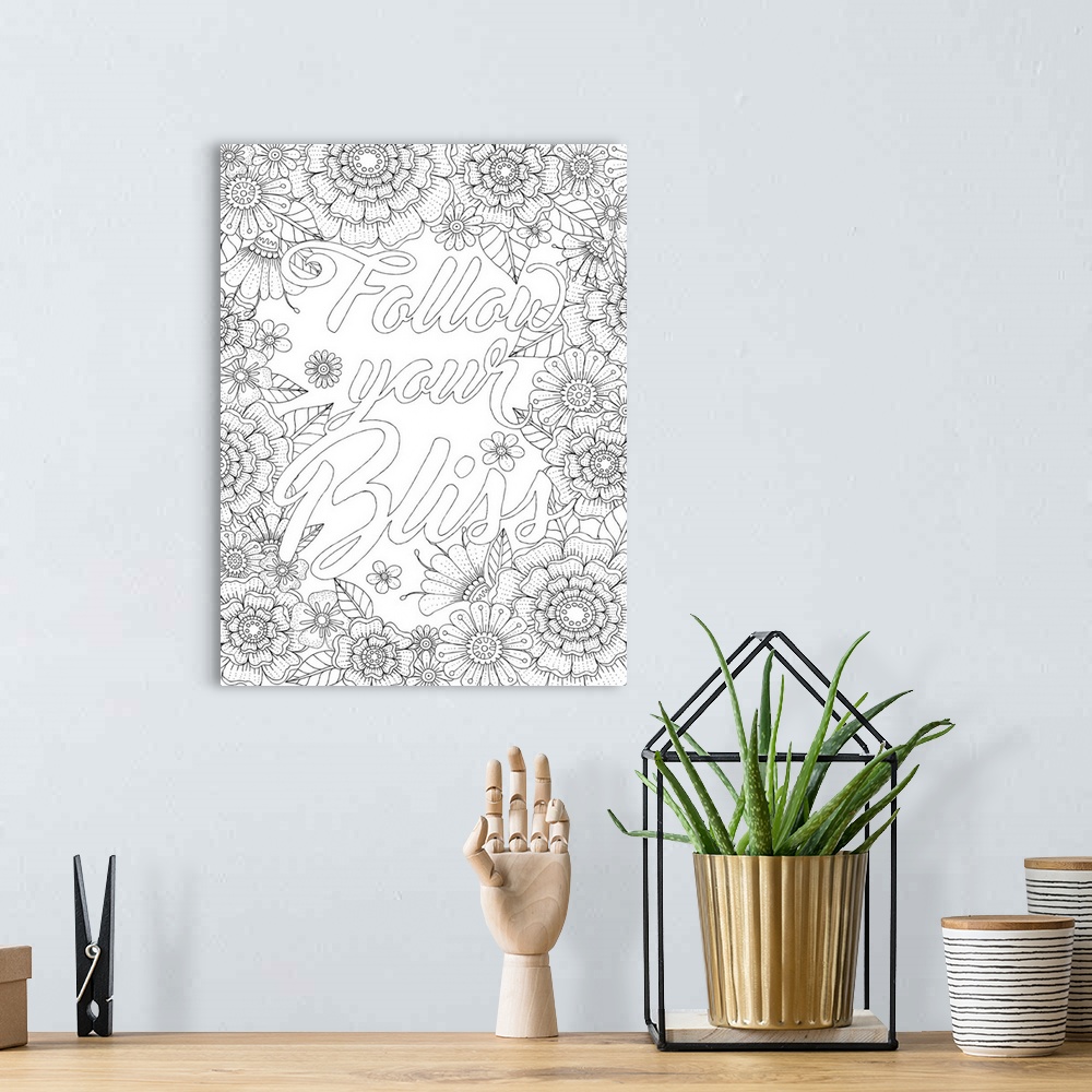 A bohemian room featuring Inspirational black and white line art with the phrase "Follow Your Bliss" written in the center ...