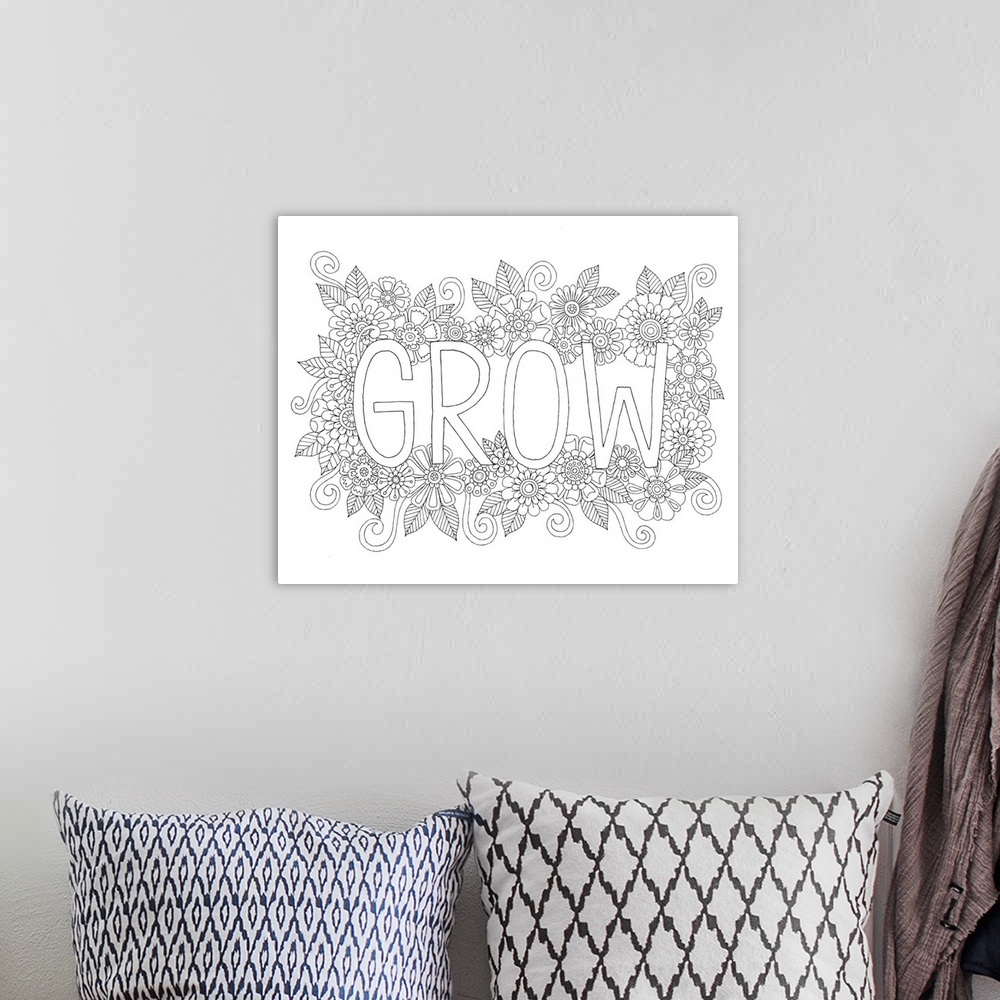 A bohemian room featuring Black and white line art with the word "Grow" written in the center surrounded by flowers.