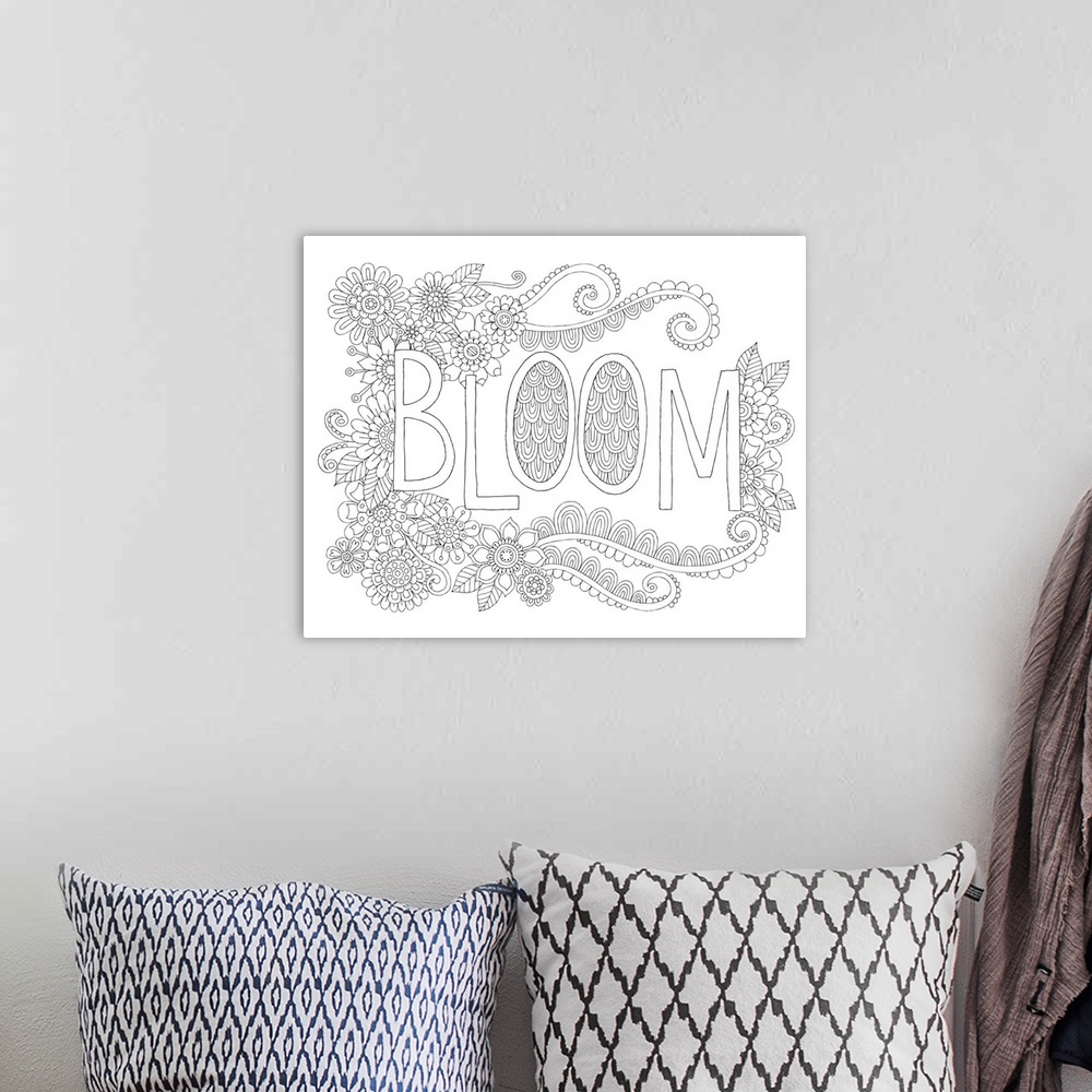 A bohemian room featuring Black and white line art with the word "Bloom" written in the center and surrounded by flowers.