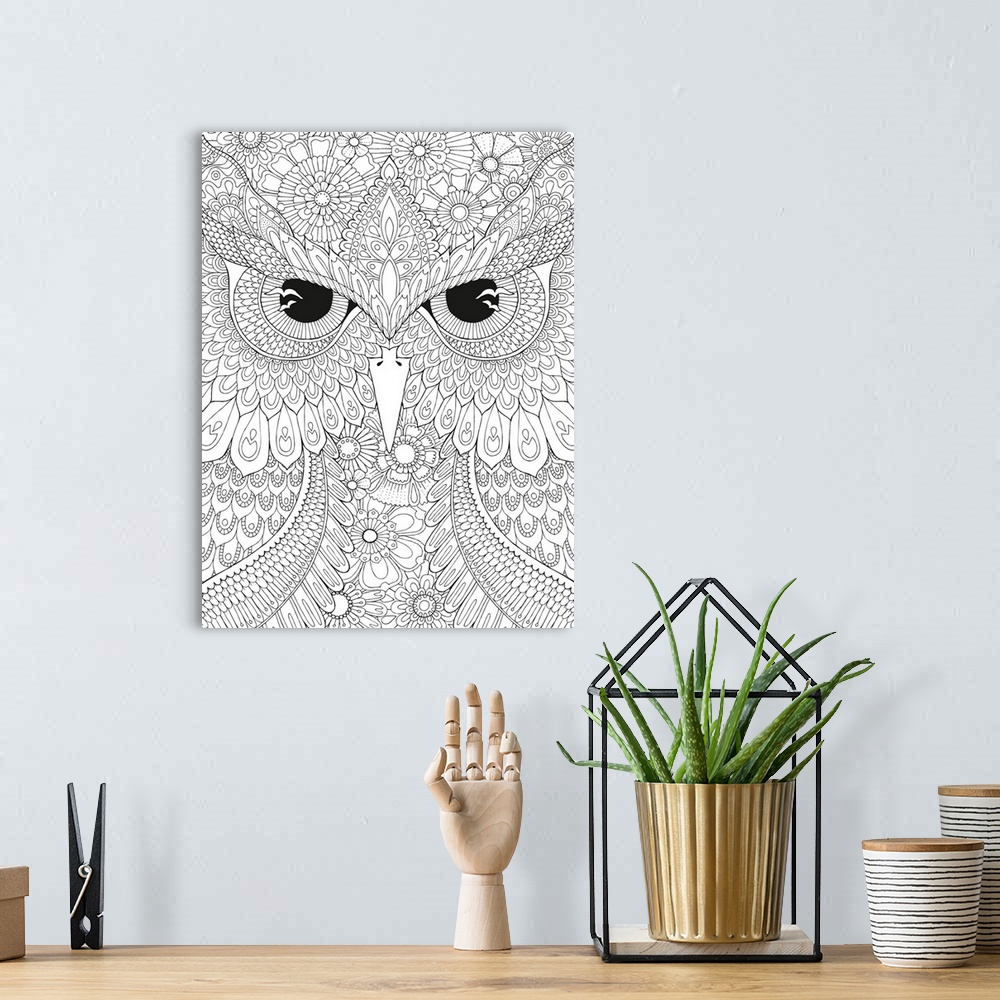A bohemian room featuring Black and white intricate line art of a close-up owl face.