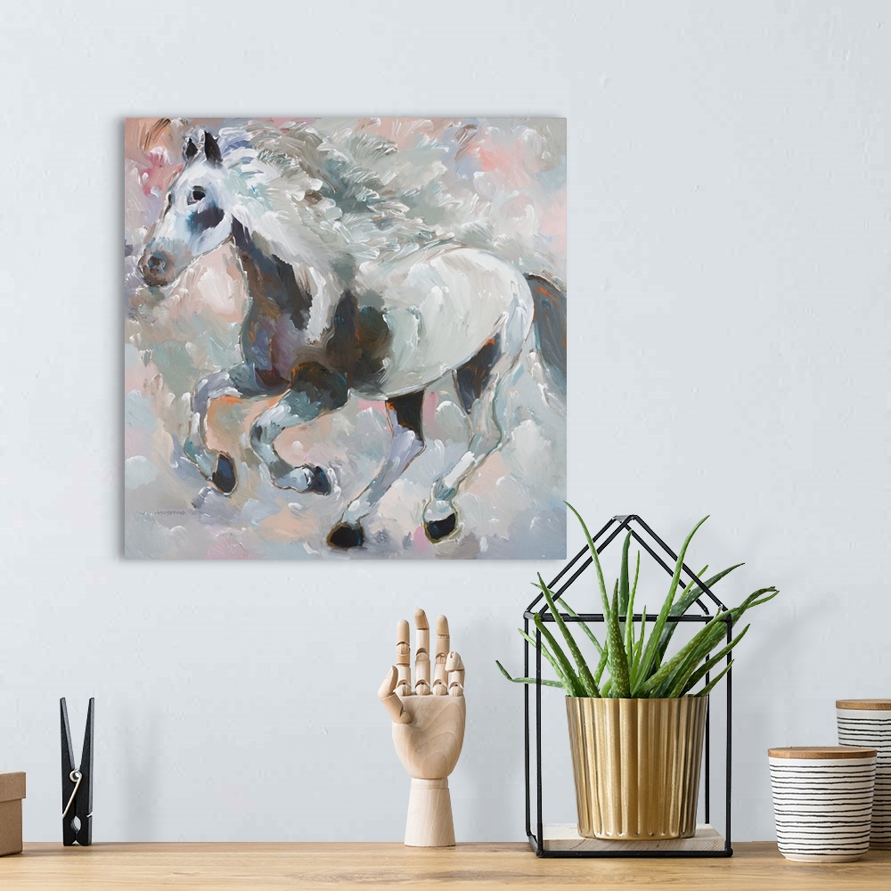 A bohemian room featuring Square contemporary painting of a gray, black, and white galloping horse with pops of orange and ...