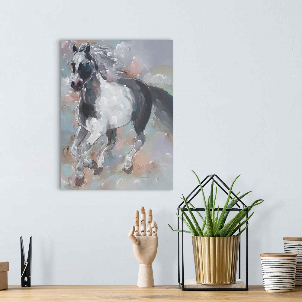 A bohemian room featuring Contemporary painting of a black and white galloping horse with pops of blue on a colorful pastel...