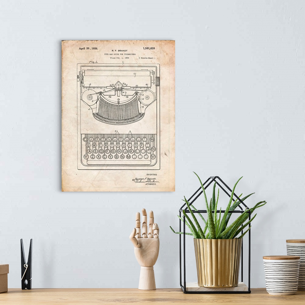 A bohemian room featuring Vintage Parchment Dayton Portable Typewriter Patent Poster