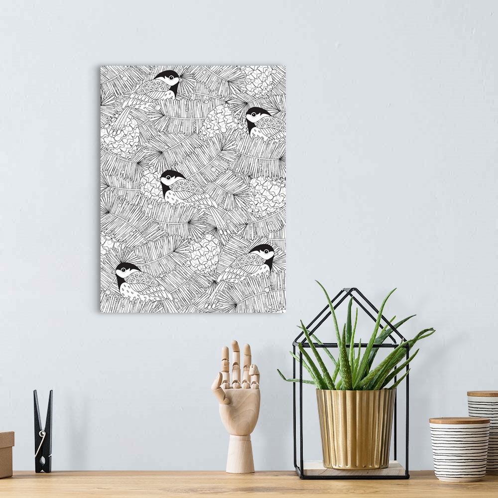 A bohemian room featuring Contemporary lined art with designed birds, leaves, and pine cones.
