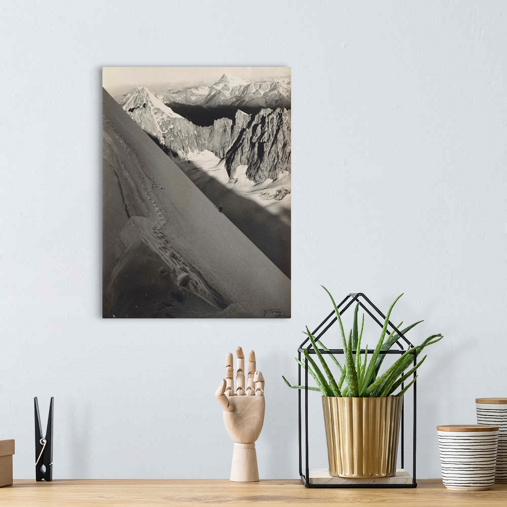A bohemian room featuring A climber ascending the North East face of les Droites, Chamonix, France, silver gelatin print.  ...