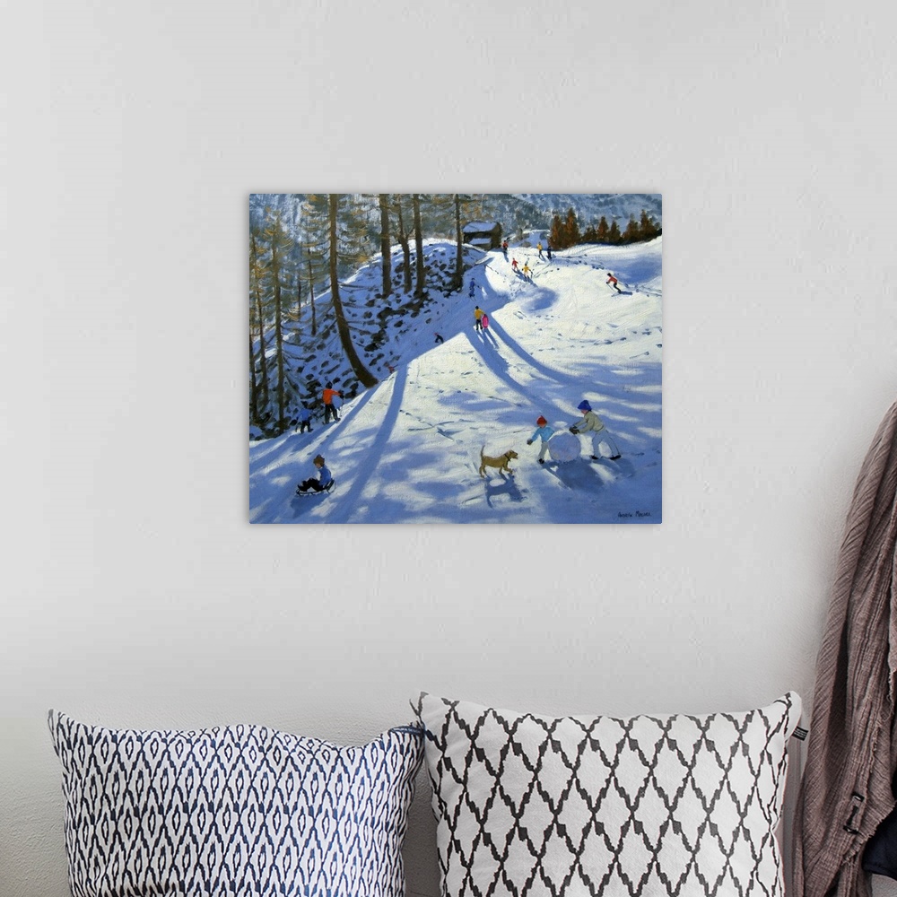 A bohemian room featuring Artwork of children playing on a snow covered hill with footprints all around and a mountain rang...