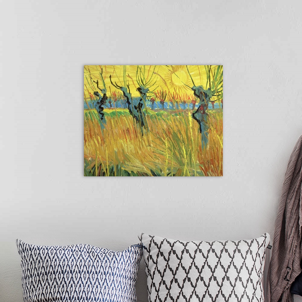 A bohemian room featuring Classical art painting of willow trees sticking up in high grass as the sun sets in the background.