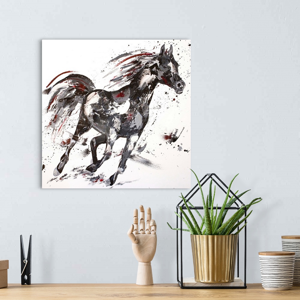 A bohemian room featuring Contemporary painting using black and gray tones to create a horse running against a white backgr...