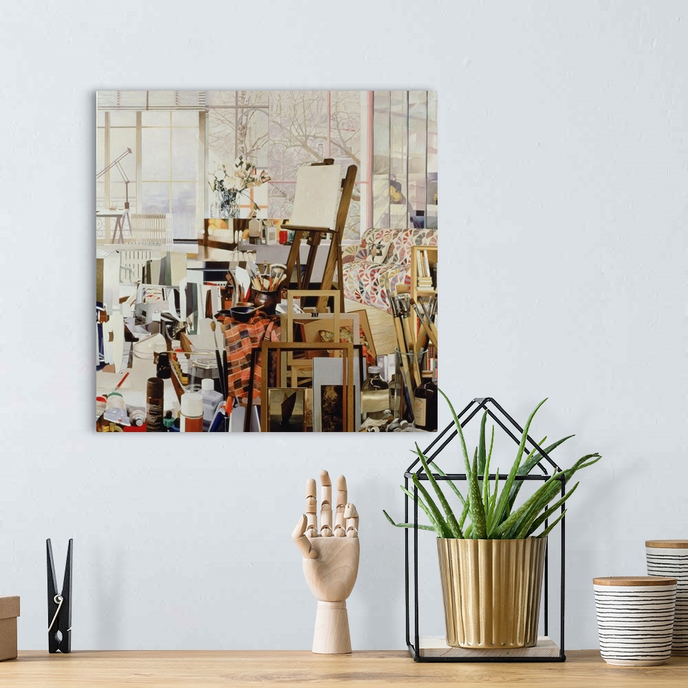 A bohemian room featuring Contemporary painting of an easel in a cluttered studio.