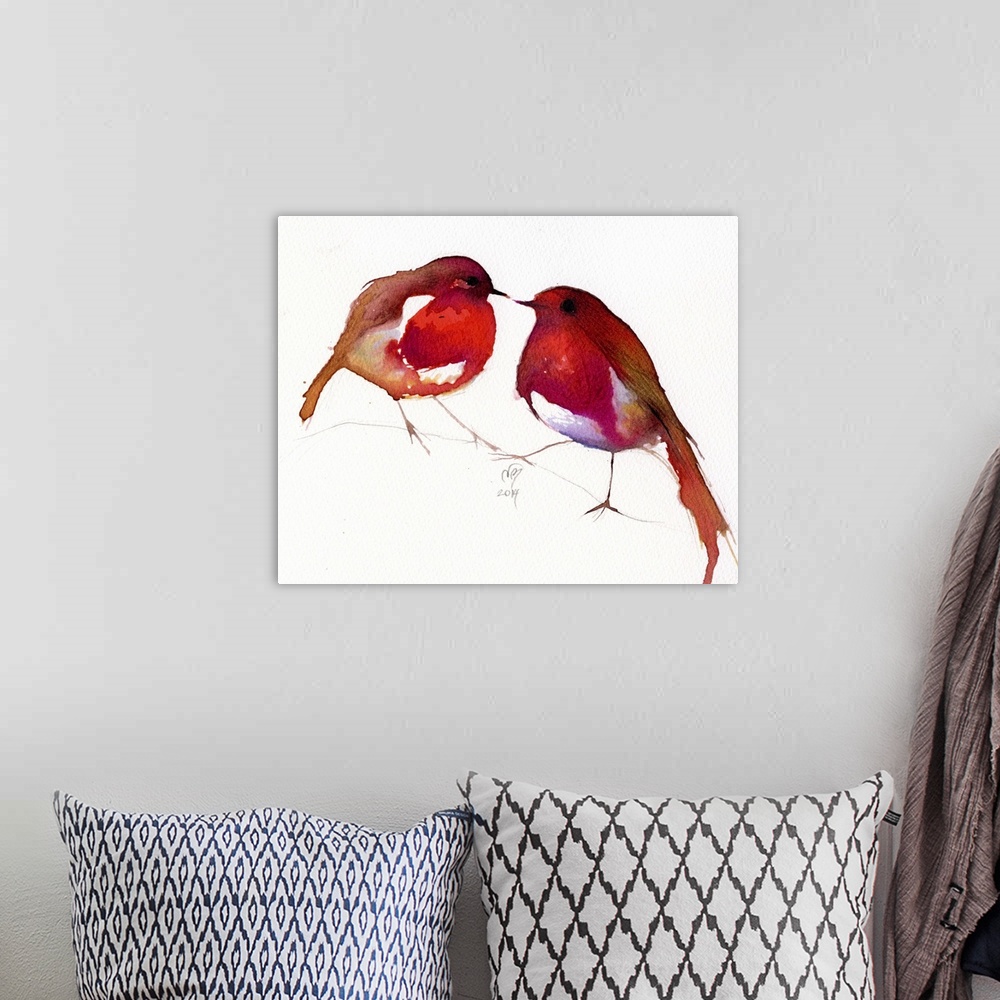A bohemian room featuring Contemporary artwork of two bright red birds against a white background.