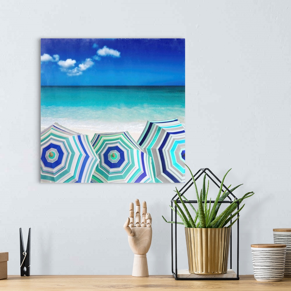 A bohemian room featuring Square illustration of three blue and white striped beach umbrellas in a row right in front of th...