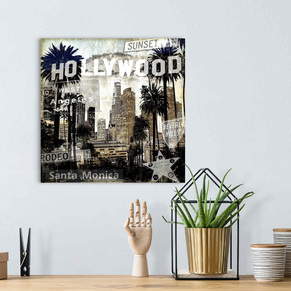 A bohemian room featuring Square home decor with a cityscape of LA/Hollywood in black and sepia tones with well-known stree...