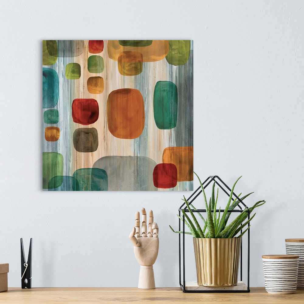A bohemian room featuring Square abstract art with a vertical lined background and colorful geometric shapes on top in vari...