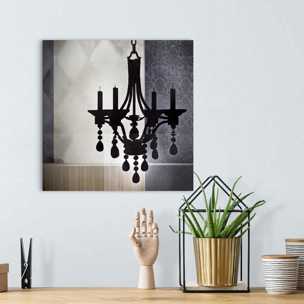 A bohemian room featuring Square contemporary artwork of a black chandelier against a pattern wall.