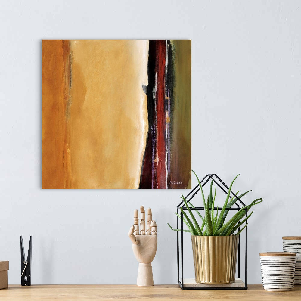 A bohemian room featuring Square abstract with vertical lines in tones of red, black, gold, and green.