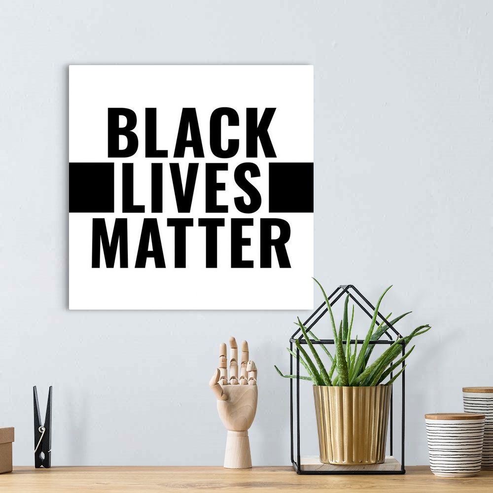 A bohemian room featuring Black Lives Matter