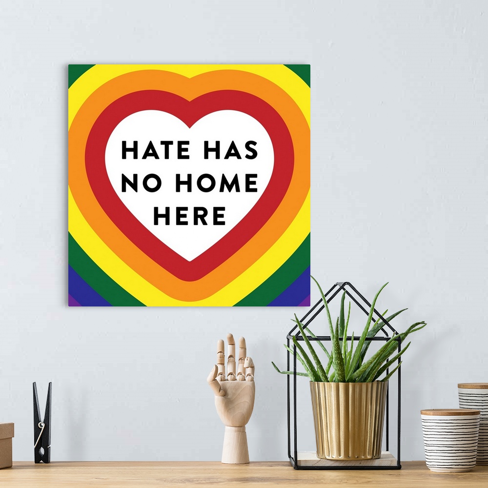 A bohemian room featuring Hate Has No Home Pride