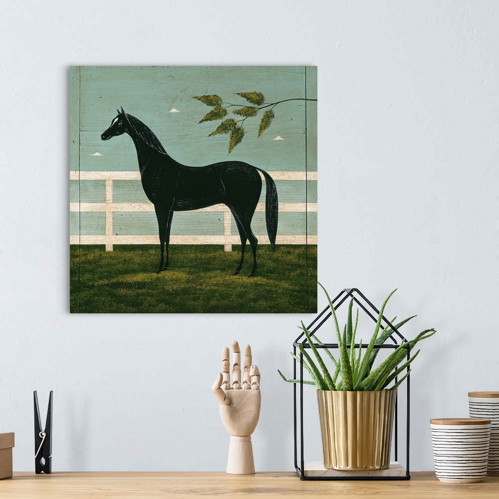 A bohemian room featuring Square fold art on a big wall hanging of a black horse with small legs and head, standing in the ...