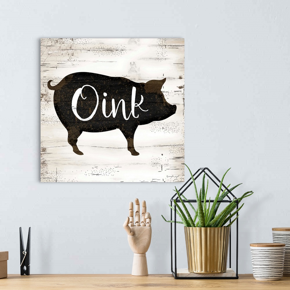 A bohemian room featuring Rustic art of the silhouette of a pig with script text over it, on a background with an old wood ...