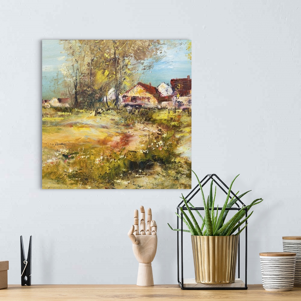 A bohemian room featuring Landscape with village, originally an oil painting.