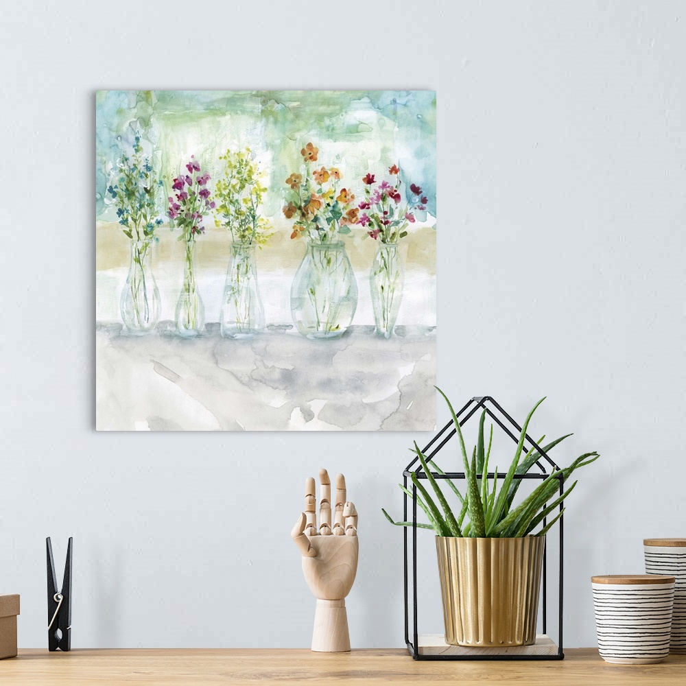 A bohemian room featuring Square watercolor painting of five vases filled with wildflowers.