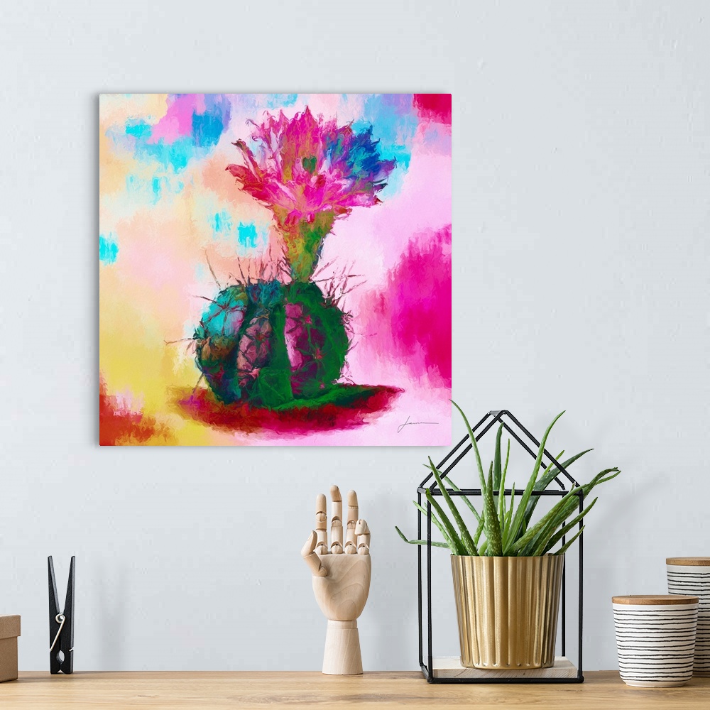 A bohemian room featuring A bright colored image of a rounded cactus with a large bloom on a multi-colored backdrop.