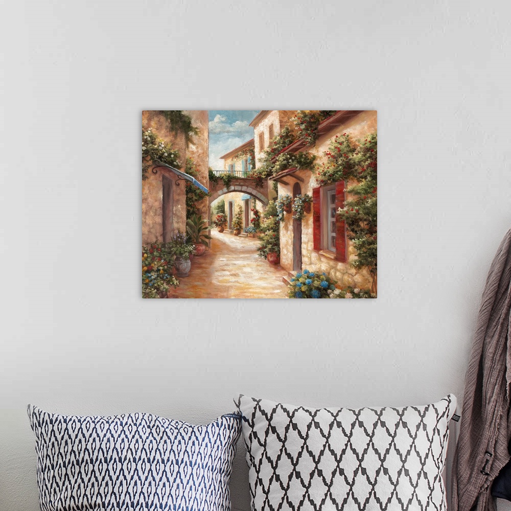 A bohemian room featuring A traditional style painting of a cobblestone alleyway in an Italian village, with doors and wind...