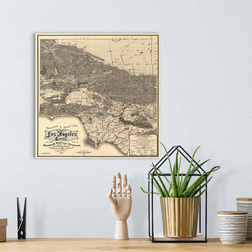 A bohemian room featuring Square vintage road map for Los Angeles from 1900.