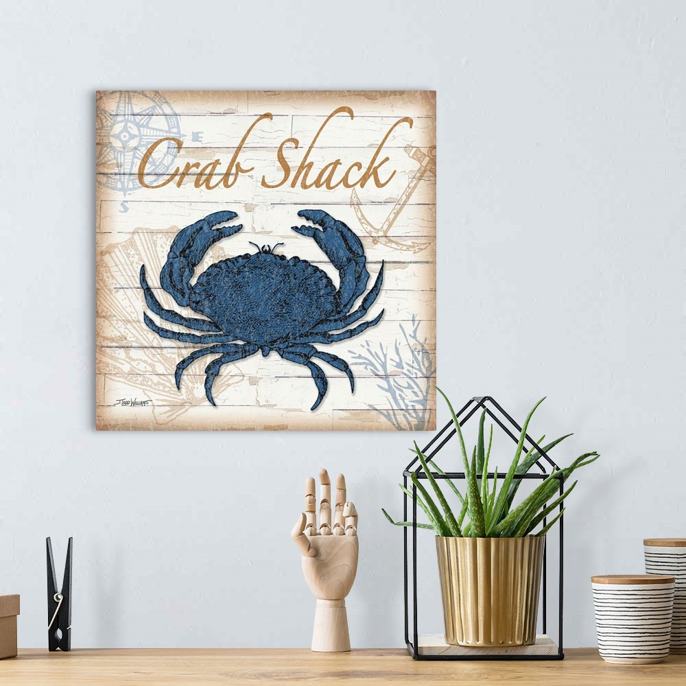 A bohemian room featuring Blue, gold, and brown square beach decor with an illustration of a blue crab.