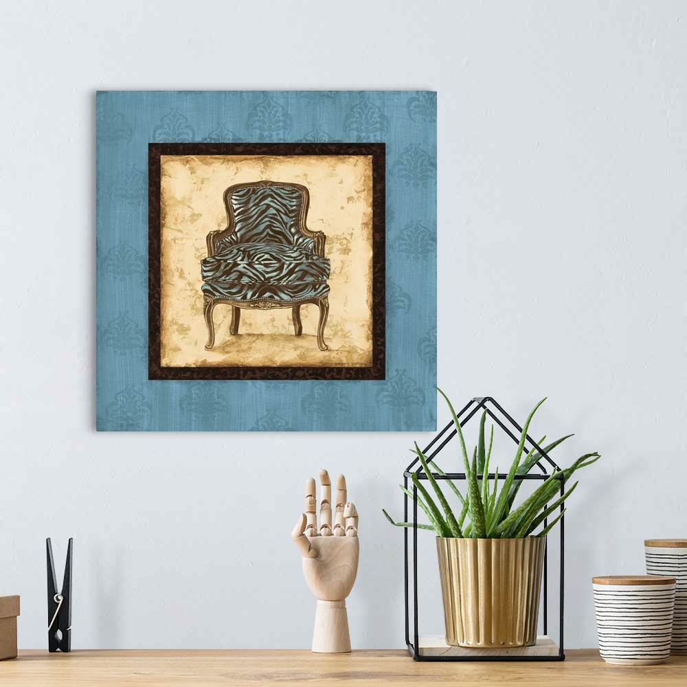 A bohemian room featuring Square painting with a blue and brown zebra striped chair in the center with a tan background and...