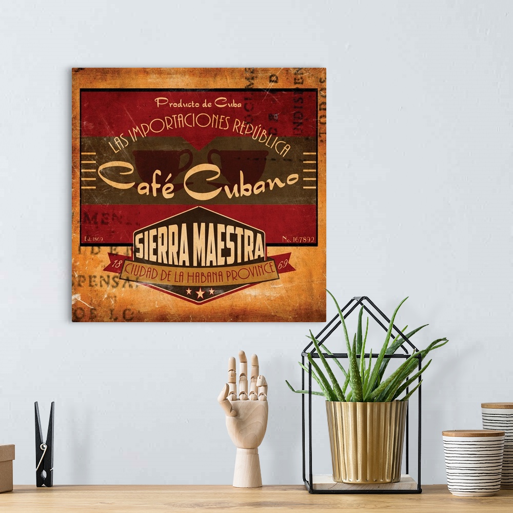 A bohemian room featuring Square kitchen decor of a vintage Cafe Cubano coffee advertisement.