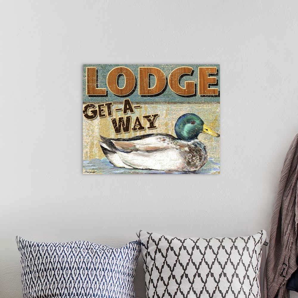 A bohemian room featuring Lake decor with an illustration of a duck and "Lodge Get-A-Way" written at the top in shades of b...
