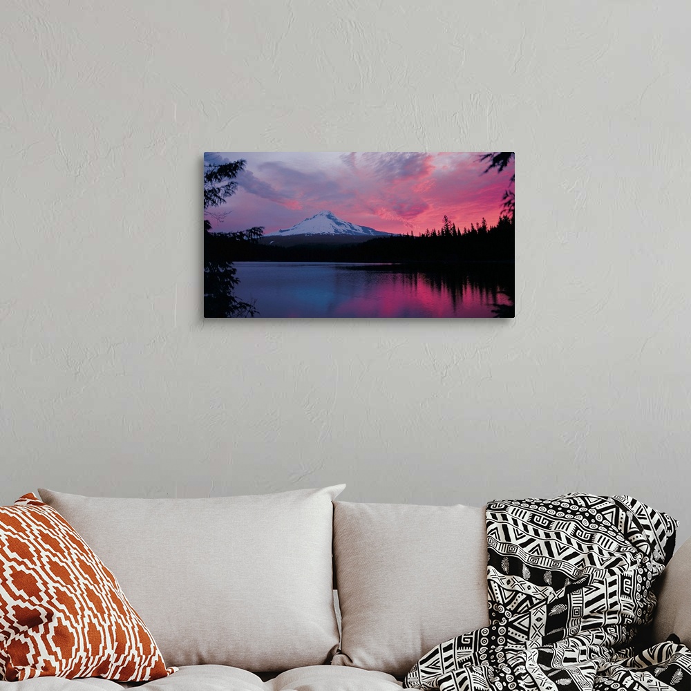 A bohemian room featuring Intense sunset colors in the clouds over Mount Hood.