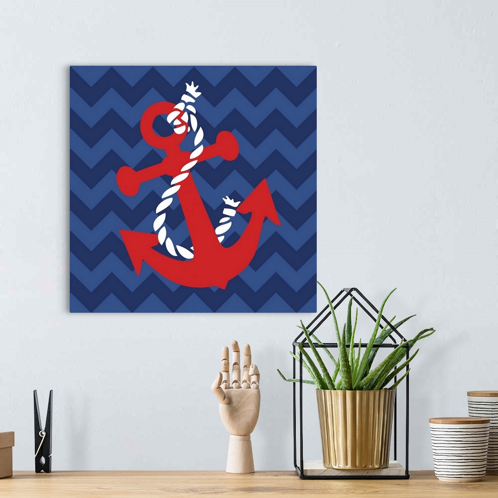 A bohemian room featuring Square nautical art with an illustration of a red anchor and white rope on a blue zig-zag pattern...
