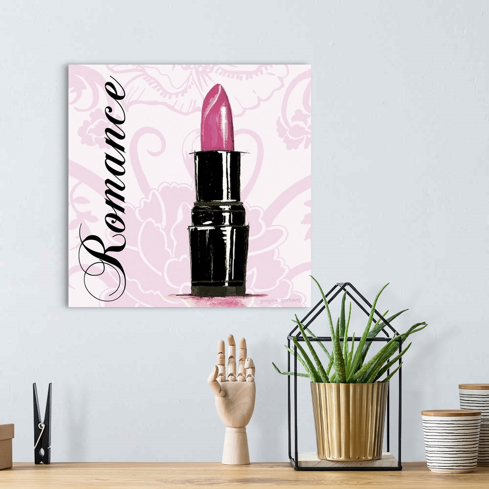 A bohemian room featuring Decorative square art with a pink floral background and an illustration of a tube of lipstick wit...