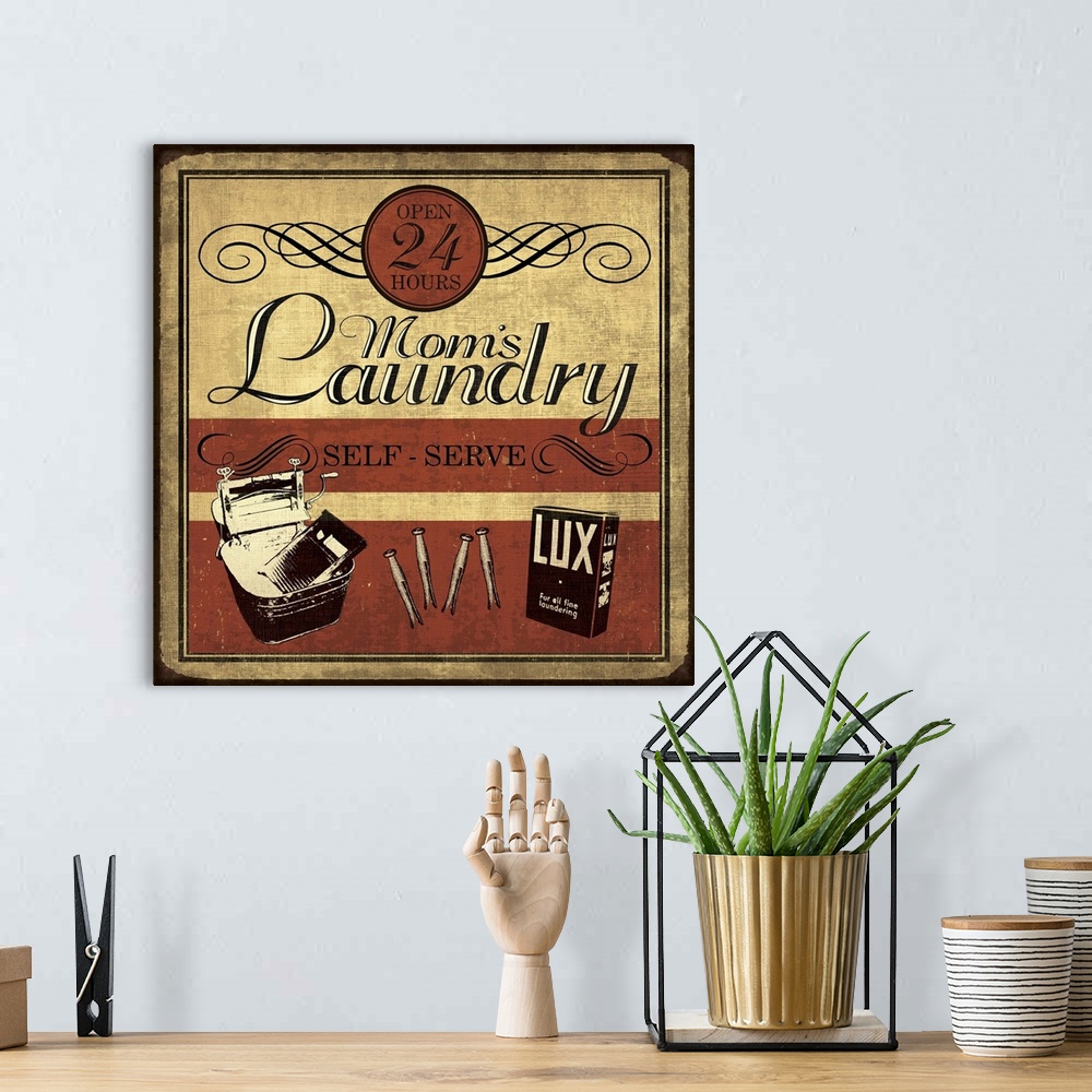 A bohemian room featuring Vintage "Mom's Laundry" sign in red, black, and cream.