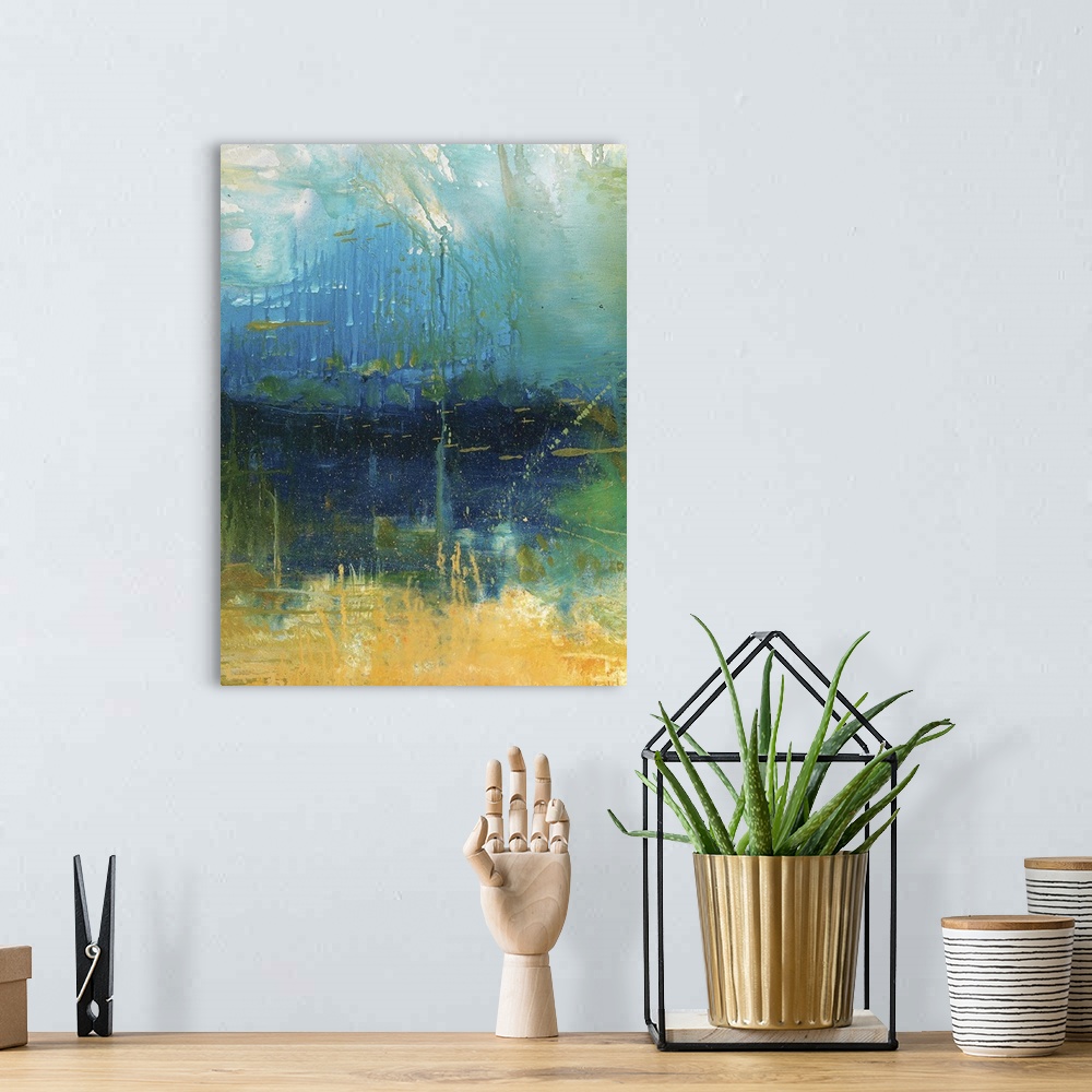 A bohemian room featuring Abstract painting in blue, green, yellow, and orange hues.